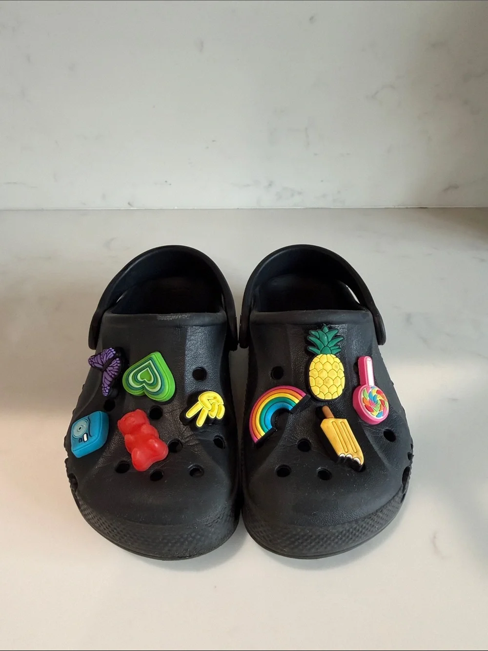 CROCS Kids Black Clogs with Colorful Charm Pins
